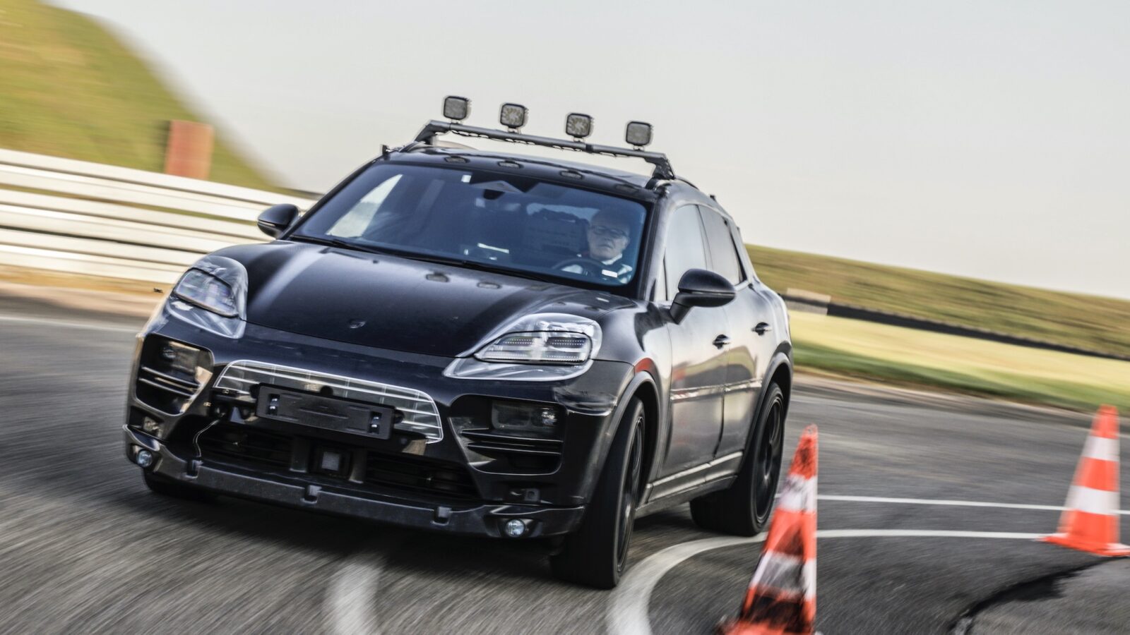 2023 Porsche Macan electric prototype on a track